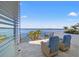 Relax on this balcony with serene water views and comfortable seating at 1843 Bayou Grande Ne Blvd, St Petersburg, FL 33703
