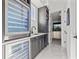 Modern bar with wine coolers, wet bar and custom cabinetry at 1843 Bayou Grande Ne Blvd, St Petersburg, FL 33703