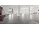 Spacious basement with concrete flooring, white walls, and natural light at 1843 Bayou Grande Ne Blvd, St Petersburg, FL 33703