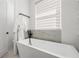 Modern bathroom featuring a soaking tub, and a sleek design at 1843 Bayou Grande Ne Blvd, St Petersburg, FL 33703