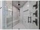 Modern walk-in shower features marble tiling, glass surround, and multiple shower heads at 1843 Bayou Grande Ne Blvd, St Petersburg, FL 33703