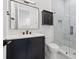 Chic bathroom featuring a tiled shower, modern vanity, and updated fixtures at 1843 Bayou Grande Ne Blvd, St Petersburg, FL 33703