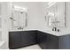 Contemporary bathroom featuring dual vanities, dark cabinets, and modern fixtures at 1843 Bayou Grande Ne Blvd, St Petersburg, FL 33703