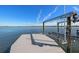Dock featuring a boat lift, providing convenient access to the water at 1843 Bayou Grande Ne Blvd, St Petersburg, FL 33703