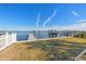 Waterfront property featuring a private dock with boat lift, offering direct access to the open water and stunning views at 1843 Bayou Grande Ne Blvd, St Petersburg, FL 33703