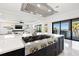 Gourmet kitchen boasts a large island with a gas range and open-concept layout at 1843 Bayou Grande Ne Blvd, St Petersburg, FL 33703