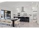 Bright kitchen with an open floorplan perfect for entertaining with an island, barstool seating and stainless appliances at 1843 Bayou Grande Ne Blvd, St Petersburg, FL 33703
