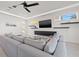 Bright living room with comfortable seating, modern decor, and ample natural light at 1843 Bayou Grande Ne Blvd, St Petersburg, FL 33703
