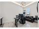 Modern home office with sleek furniture, ample lighting and a comfortable seating area at 1843 Bayou Grande Ne Blvd, St Petersburg, FL 33703