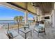 Spacious outdoor patio with comfortable seating, an outdoor kitchen and serene waterfront views at 1843 Bayou Grande Ne Blvd, St Petersburg, FL 33703