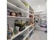Spacious pantry with ample shelving for organized food and supply storage at 1843 Bayou Grande Ne Blvd, St Petersburg, FL 33703