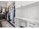 Well-designed walk-in closet with custom cabinets, drawers, and ample storage space at 1843 Bayou Grande Ne Blvd, St Petersburg, FL 33703