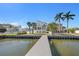 Waterfront home with private dock offering stunning waterfront views and boat access for relaxing coastal living at 1843 Bayou Grande Ne Blvd, St Petersburg, FL 33703