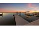 Beautiful waterfront dock with boat lift offers serene views and direct access to the water at 1843 Bayou Grande Ne Blvd, St Petersburg, FL 33703