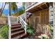 Landscaped backyard featuring a staircase leading up to the main house at 235 1/2 17Th Ave Se Se Ave, St Petersburg, FL 33701