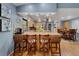Welcoming kitchen with seating at counter, open to breakfast nook and features stainless steel appliances at 3137 Valemoor Dr, Palm Harbor, FL 34685