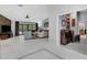 Open-concept living room with tile floors and access to the pool at 3137 Valemoor Dr, Palm Harbor, FL 34685