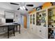 Bright and airy office with storage and a view to promote focus and calm at 3137 Valemoor Dr, Palm Harbor, FL 34685