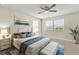 Bedroom featuring a large bed with nice bedding, and three windows at 3148 Marine Grass Dr, Wimauma, FL 33598