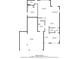Detailed first-floor floor plan showcasing the layout of the kitchen, living room, garage, and bedroom at 3148 Marine Grass Dr, Wimauma, FL 33598