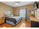 Cozy bedroom with hardwood floors and natural light at 3415 Croaker Dr, Hernando Beach, FL 34607