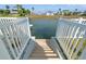 A private dock with steps leading to the waterfront at 3415 Croaker Dr, Hernando Beach, FL 34607