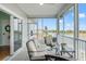 Enjoy the outdoors on this screened patio with comfortable seating and tranquil waterfront views at 3415 Croaker Dr, Hernando Beach, FL 34607