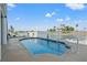 Refreshing backyard pool, with an enclosed fence and scenic views of the lake at 3415 Croaker Dr, Hernando Beach, FL 34607