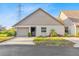 Charming home exterior featuring a well-maintained lawn and colorful landscaping around the property at 3424 Annette Ct # 64, Clearwater, FL 33761