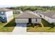 Charming single-story home with well-maintained landscaping and inviting curb appeal at 38602 Finn Clover Ln, Zephyrhills, FL 33540