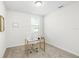 A spare bedroom has been converted to a bright, carpeted home office at 38602 Finn Clover Ln, Zephyrhills, FL 33540