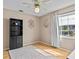Compact room with neutral walls, window, and a bookcase at 39650 Us Highway 19 N # 244, Tarpon Springs, FL 34689