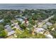 Overhead view of the house in a neighborhood close to the water, surrounded by trees at 400 5Th S Ave, Safety Harbor, FL 34695