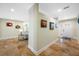 Inviting foyer with travertine tile flooring and stylish wall decor sets an elegant tone at 400 5Th S Ave, Safety Harbor, FL 34695