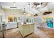 Spacious kitchen featuring tile flooring, stainless steel appliances, and a butcher block island at 400 5Th S Ave, Safety Harbor, FL 34695