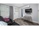 Comfortable living room with television, dining table, leather sofa, and lots of natural light at 400 5Th S Ave, Safety Harbor, FL 34695