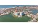Panoramic aerial view showcasing the condominium's waterfront location near the beach and surrounding community at 400 64Th Ave # 1108, St Pete Beach, FL 33706