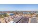 High-angle view of neighborhood showcasing a parking lot, residential homes and coastal waterway at 400 64Th Ave # 1108, St Pete Beach, FL 33706