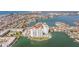 Aerial view of a waterfront condo featuring boat docks and nearby local residential community at 400 64Th Ave # 1108, St Pete Beach, FL 33706