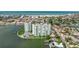 Stunning aerial view showcasing the waterfront complex, lush landscaping, and vibrant coastal surroundings at 400 64Th Ave # 1108, St Pete Beach, FL 33706