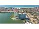 Captivating aerial view highlighting the waterfront complex and pool with picturesque coastal views at 400 64Th Ave # 1108, St Pete Beach, FL 33706