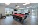 Recreation room featuring a billiards table and lots of natural light at 400 64Th Ave # 1108, St Pete Beach, FL 33706