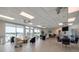 Bright community room featuring comfortable seating, tables, and scenic water views at 400 64Th Ave # 1108, St Pete Beach, FL 33706