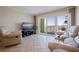 Relaxing living room area with city views and a comfortable seating arrangement with tile flooring at 400 64Th Ave # 1108, St Pete Beach, FL 33706