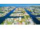 Aerial view of waterfront home with direct access to the open water at 4390 6Th Isle Dr, Hernando Beach, FL 34607