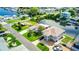 Aerial view of waterfront homes with private docks and boat access, showcasing the serene coastal community and idyllic setting at 4390 6Th Isle Dr, Hernando Beach, FL 34607