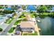 Coastal living is epitomized in this aerial image of waterfront homes with private docks, set along a picturesque canal community at 4390 6Th Isle Dr, Hernando Beach, FL 34607