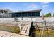Waterfront property featuring a private dock, seawall, and direct access to the water, perfect for boating and enjoying the waterfront lifestyle at 4390 6Th Isle Dr, Hernando Beach, FL 34607