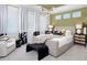 Comfortable main bedroom featuring neutral walls, contemporary furnishings, and a well-lit space with modern lighting at 4717 W Mccoy St # 18, Tampa, FL 33616