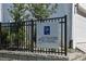 Community sign reading 'Westshore Crossing' behind a black fence and landscaping at 4717 W Mccoy St # 9, Tampa, FL 33616